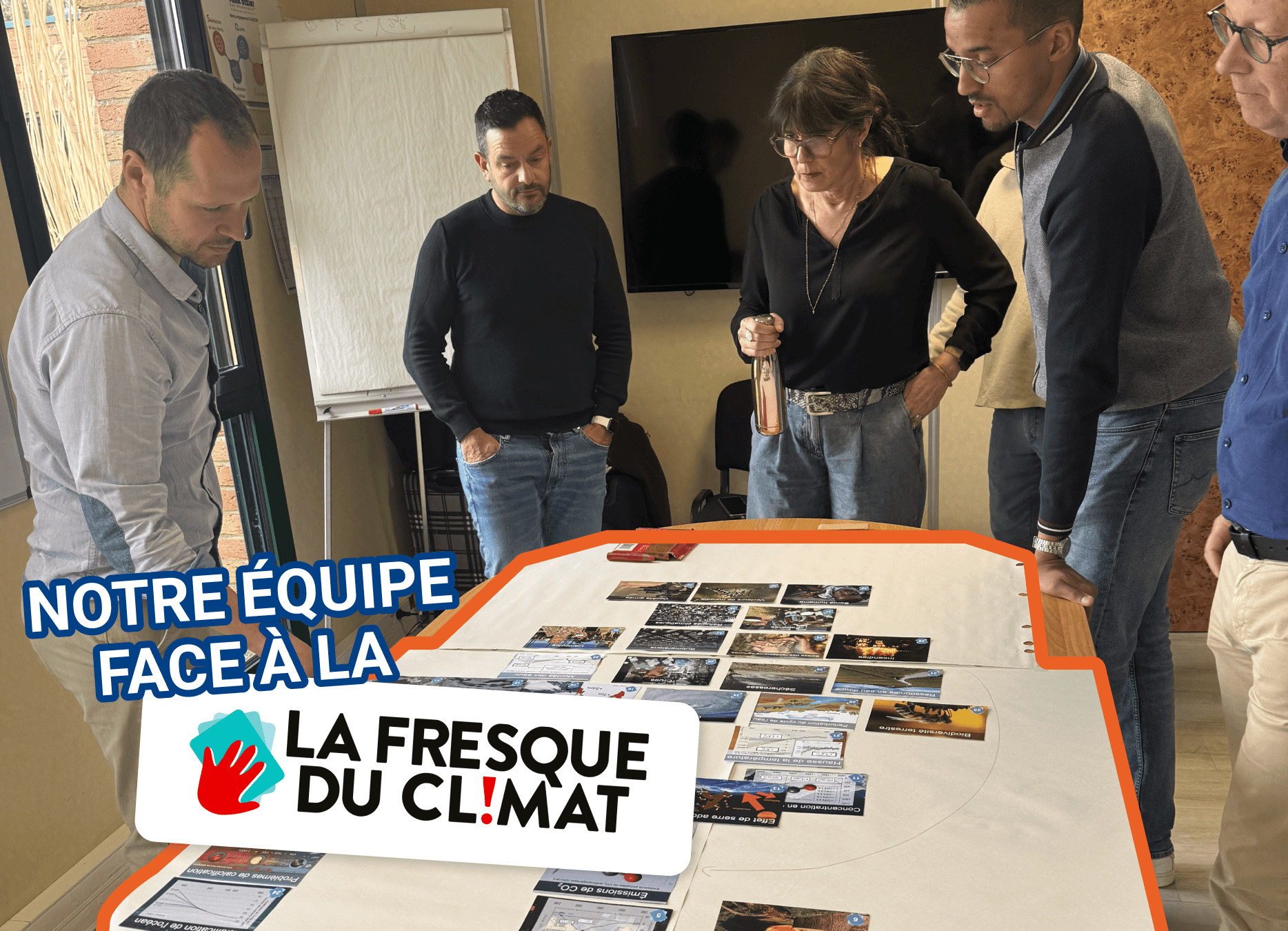 Notre équipe face à la fresque du climat chez saint dizier environnement